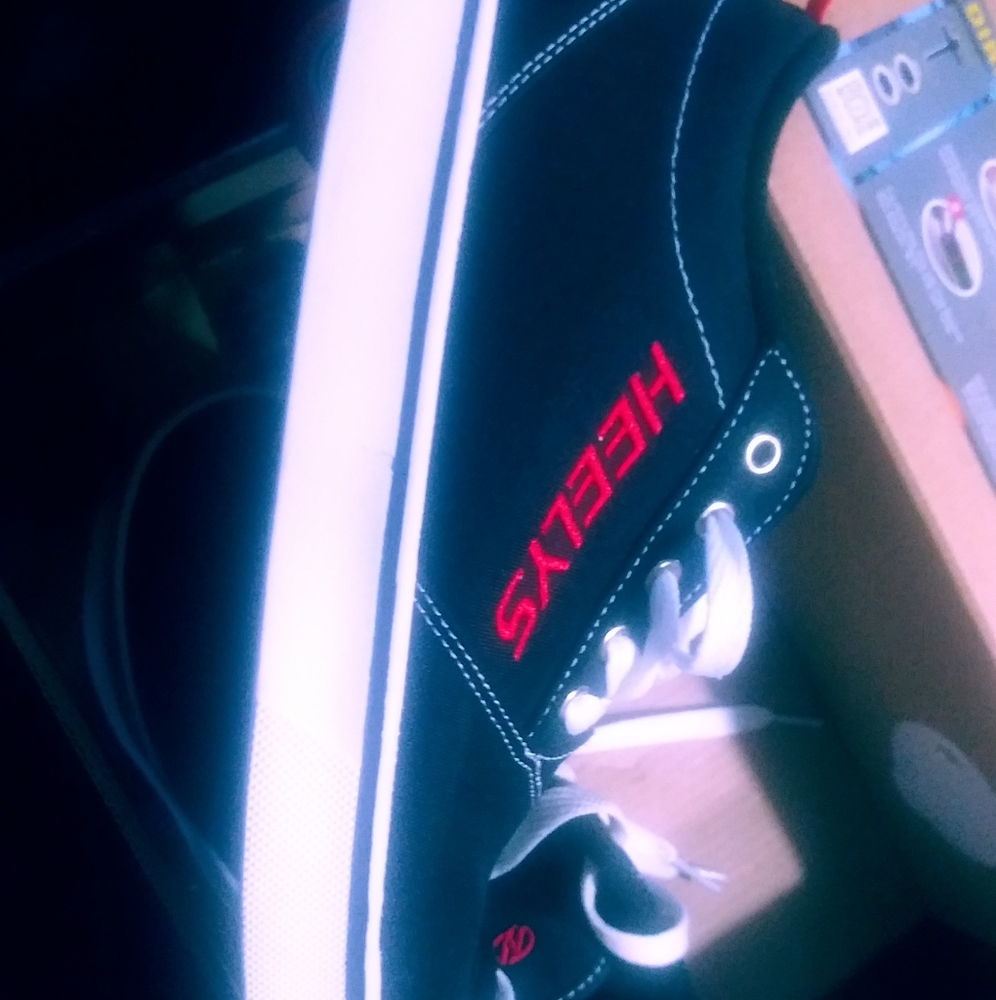 Like new Heelys youth size 6 black, red, and white